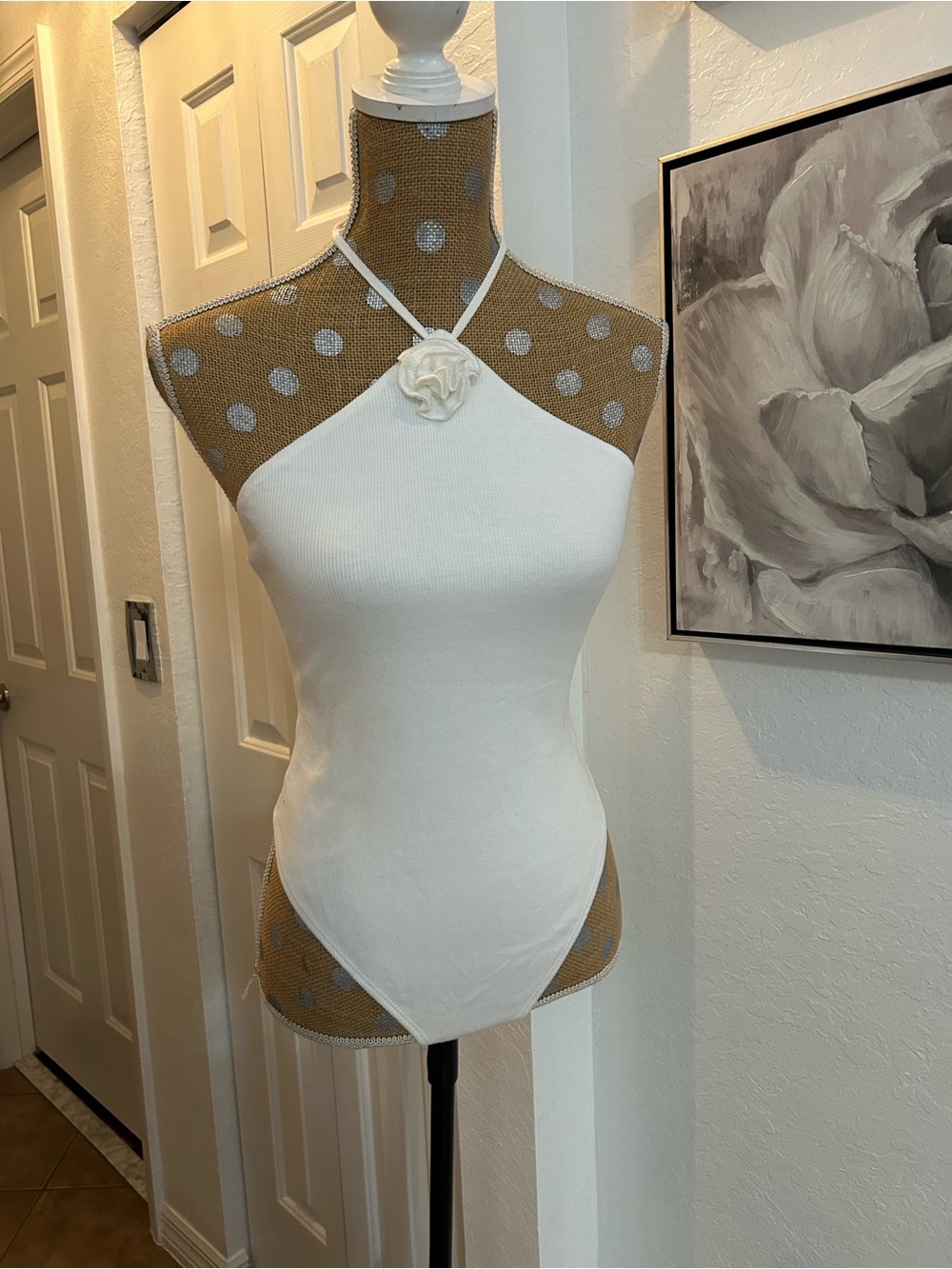 White Halter Neck Bodysuit with Floral Accent snap on bottom